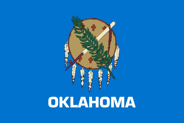 "Flag of Oklahoma". Licensed under Public Domain via Commons - 